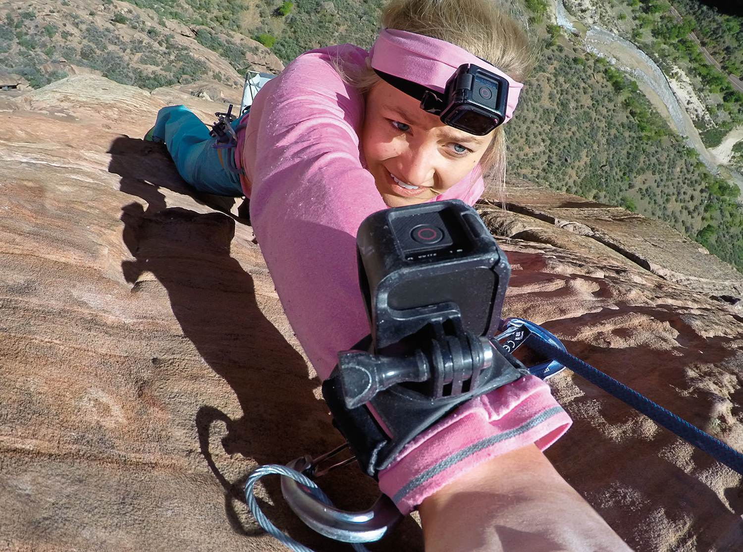 Go Pro Wrist strap hand wrist arm leg mount in use rockclimbing girl Go Pro Wrist strap hand wrist arm leg mount in use rockclimbing girl